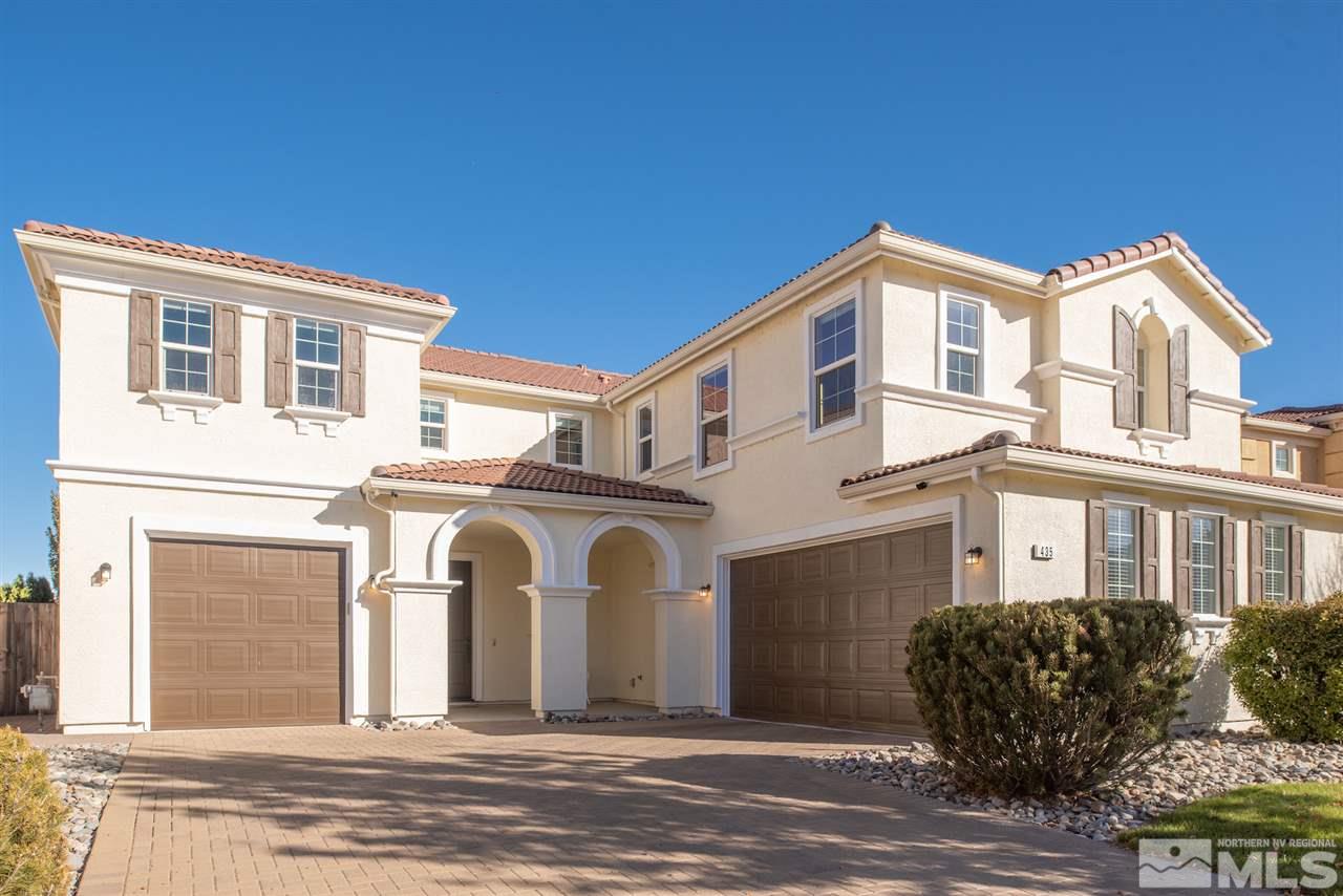 435 Sondrio Court Reno, NV 89521 - Photo 2 of 25 a front view of a house with a space