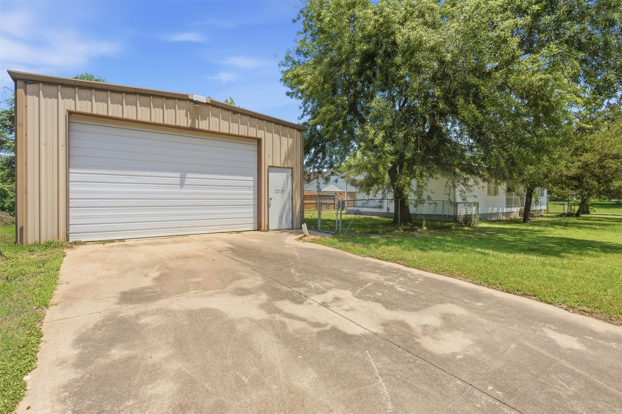 1310 Brazos Street Hempstead, TX 77445 - Photo 25 of 32 a view of a house with a yard