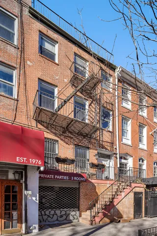 a view of bathroom with a toilet a sink and a bathtub
