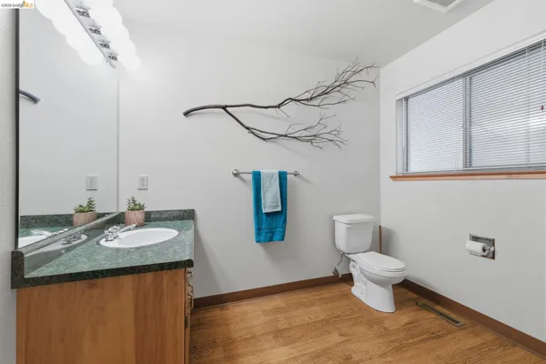 a view of a room that has a window in it