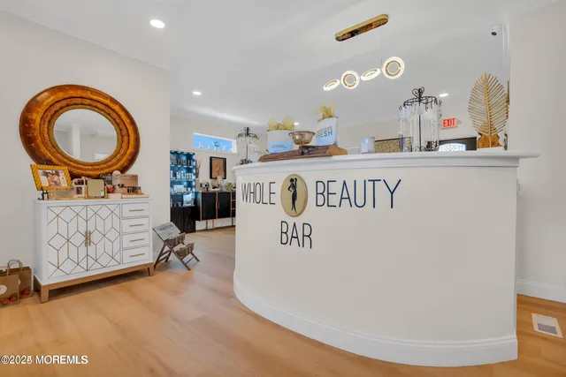 a view of kitchen with furniture and natural light