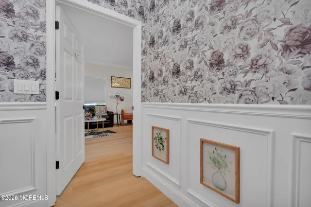 a view of a hallway with workspace