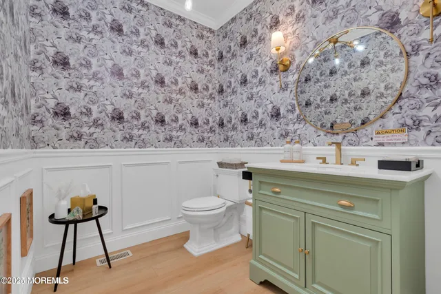 a bathroom with a toilet and a sink