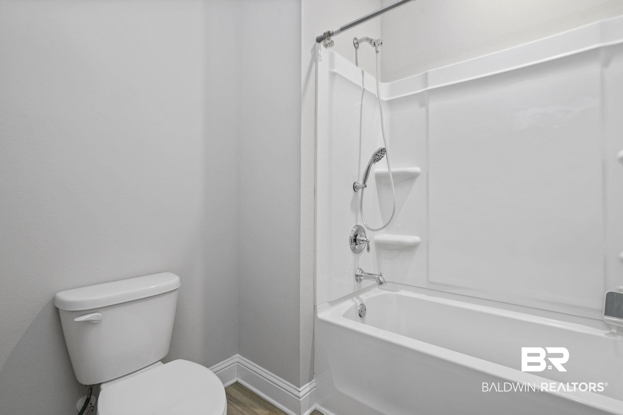 2183 Meadowview Loop Semmes, AL 36575 - Photo 19 of 58 Bathroom featuring shower / tub combination and light wood-style floors