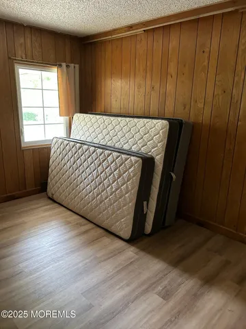 a living room with couches and painted walls
