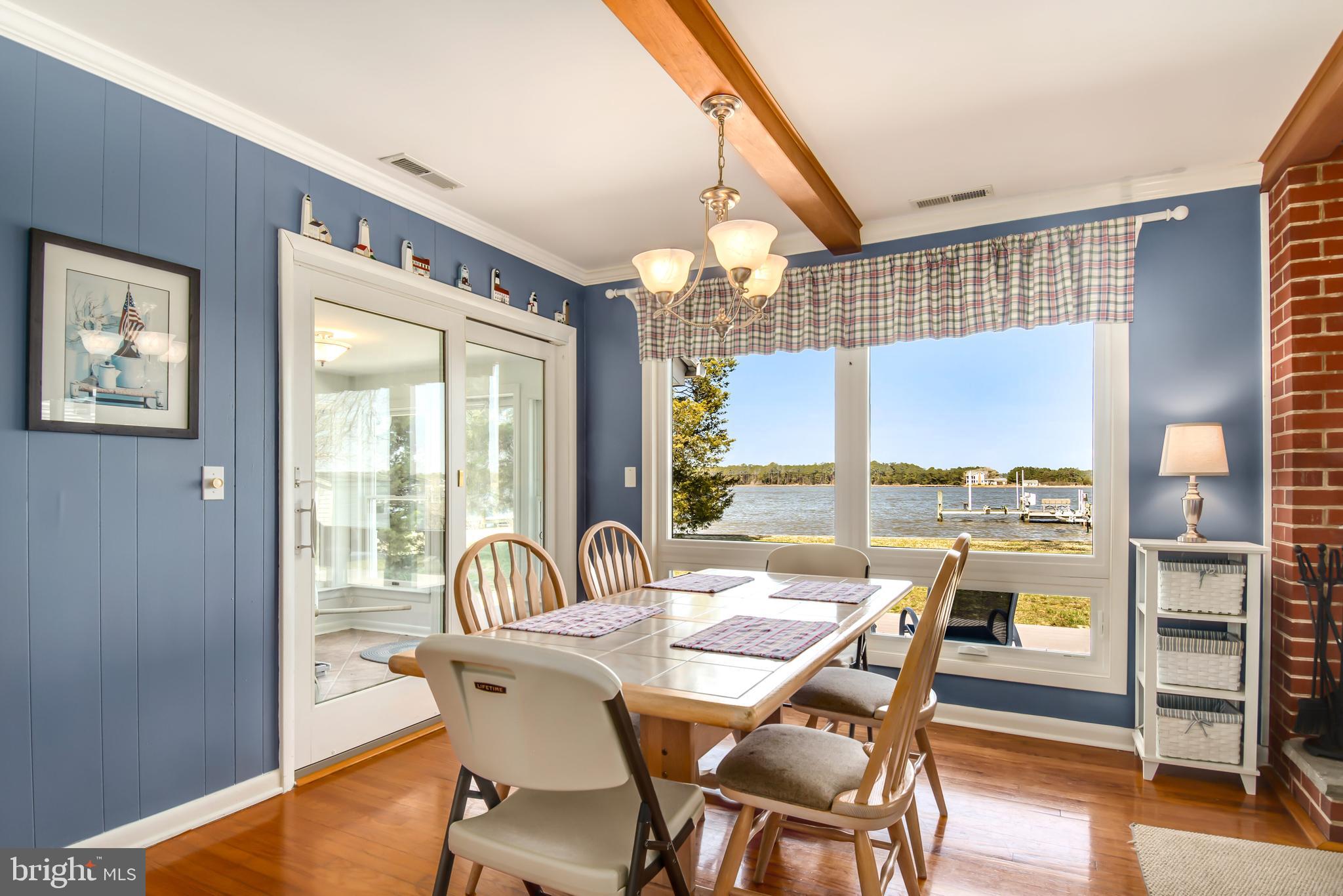 1516 Deep Point Road Woolford, MD 21677 - Photo 27 of 50 Sunroom adjacent to dining area