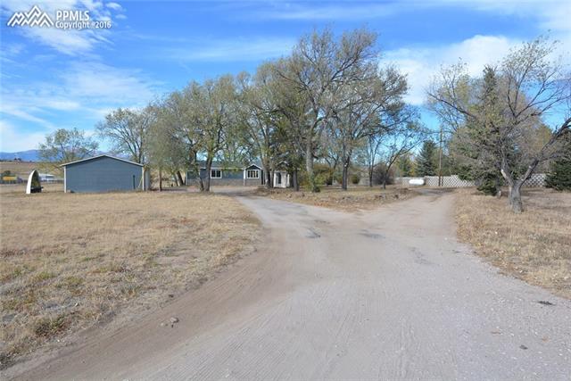 5720 Sayres Road Colorado Springs, CO 80927 - Photo 31 of 31 Driveway entrance from Sayres Road.