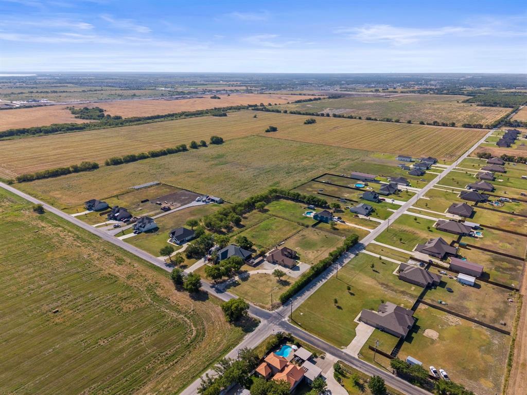 3885 Lois Road West Sanger, TX 76266 - Photo 8 of 12 Rural residential area with extensive open land and developed roads