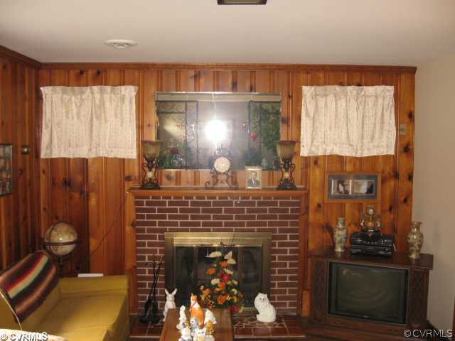 307 Meadowspring Road Richmond, VA 23223 - Photo 4 of 10 Den/Family/Great Room - Family room with a brick f