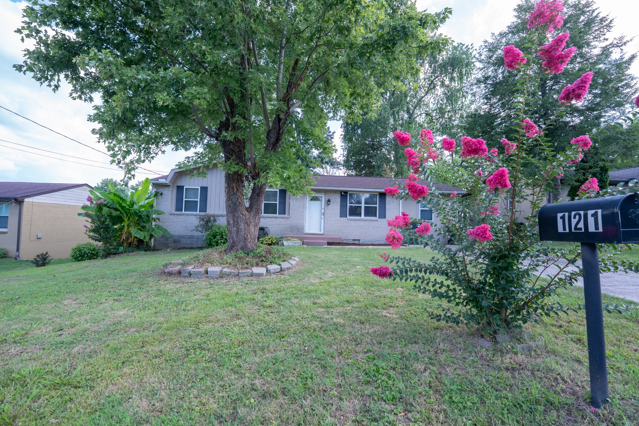 121 Tomarand Road Antioch, TN 37013 - Photo 2 of 34 a front view of a house with yard and tree s