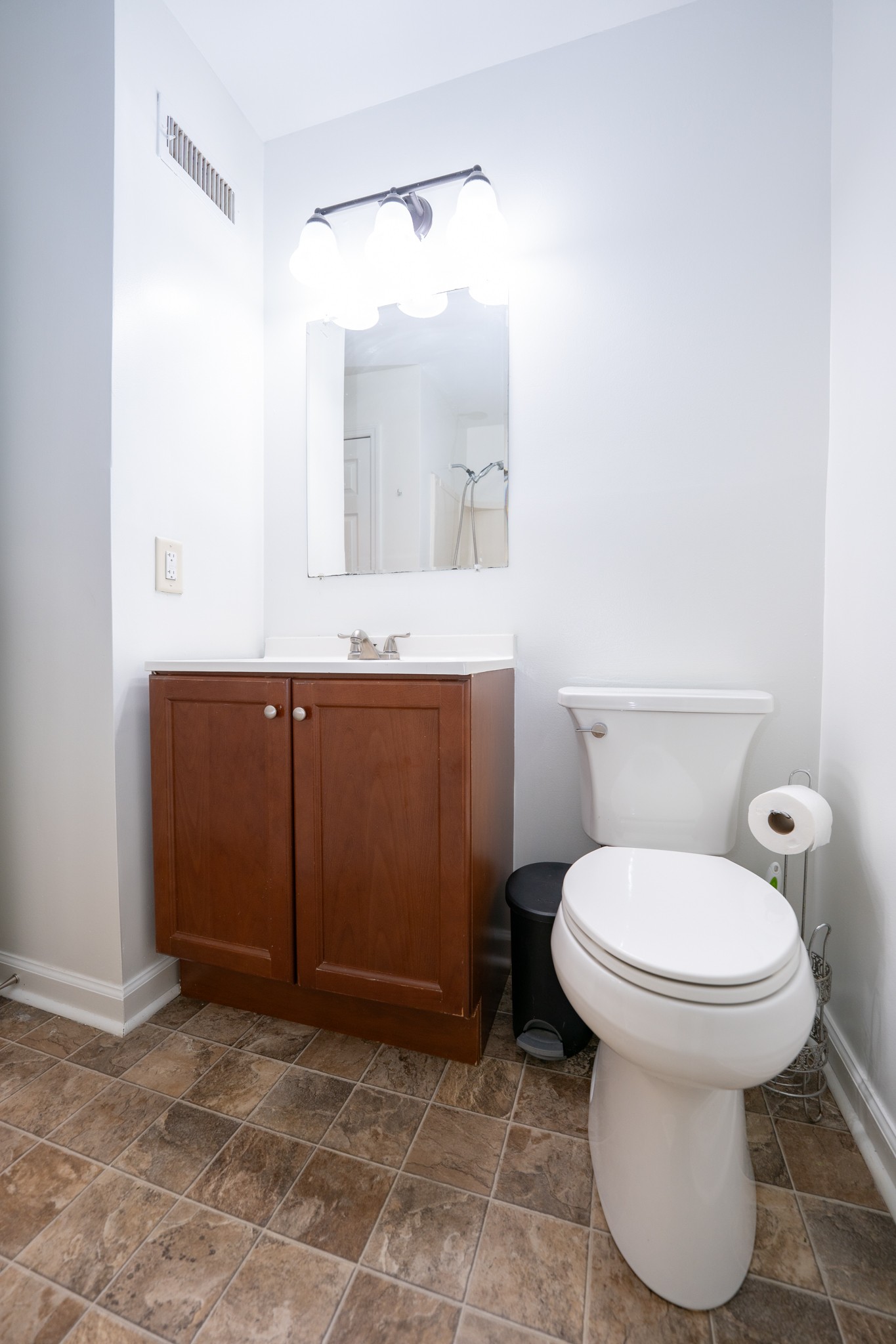 121 Tomarand Road Antioch, TN 37013 - Photo 21 of 34 a bathroom with a toilet sink and mirror
