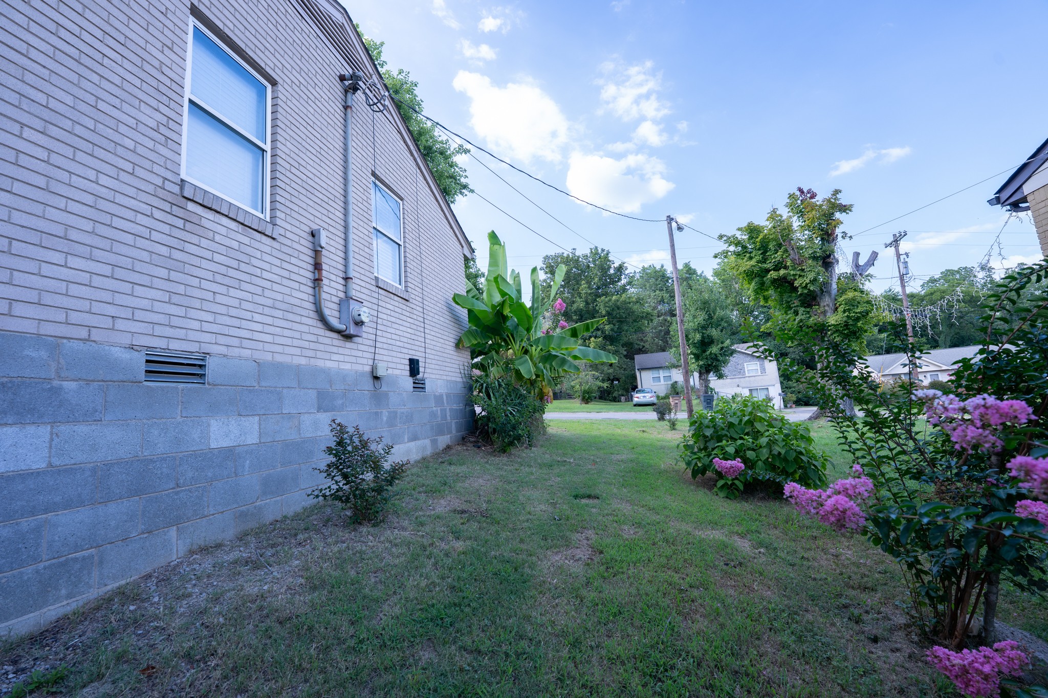 121 Tomarand Road Antioch, TN 37013 - Photo 30 of 34 a view of a house with a backyard and garden
