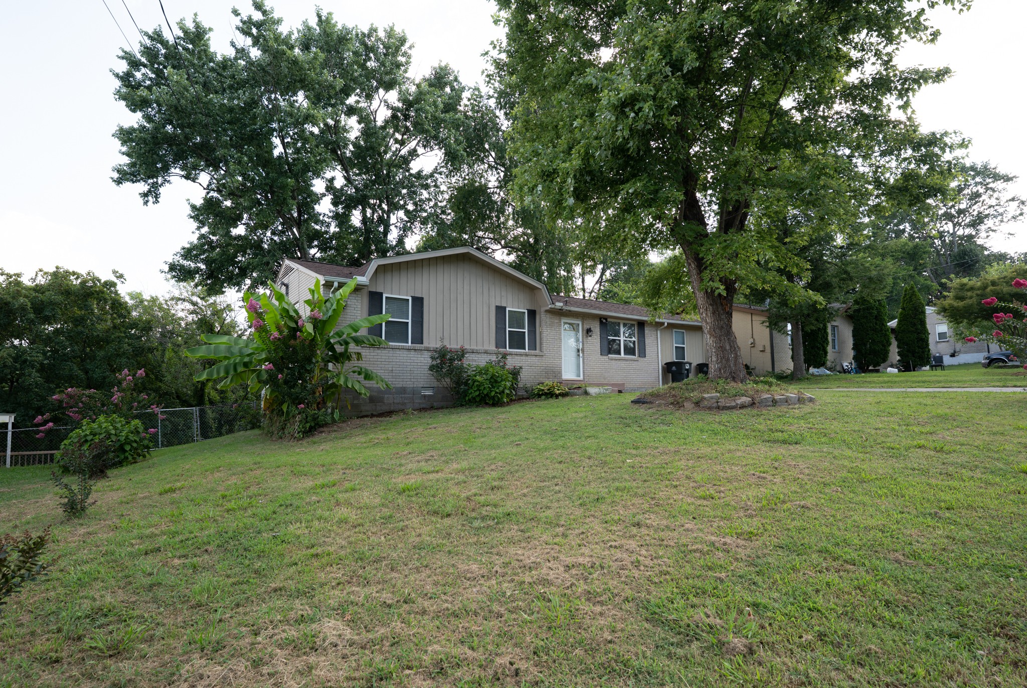 121 Tomarand Road Antioch, TN 37013 - Photo 32 of 34 a view of a house with a yard