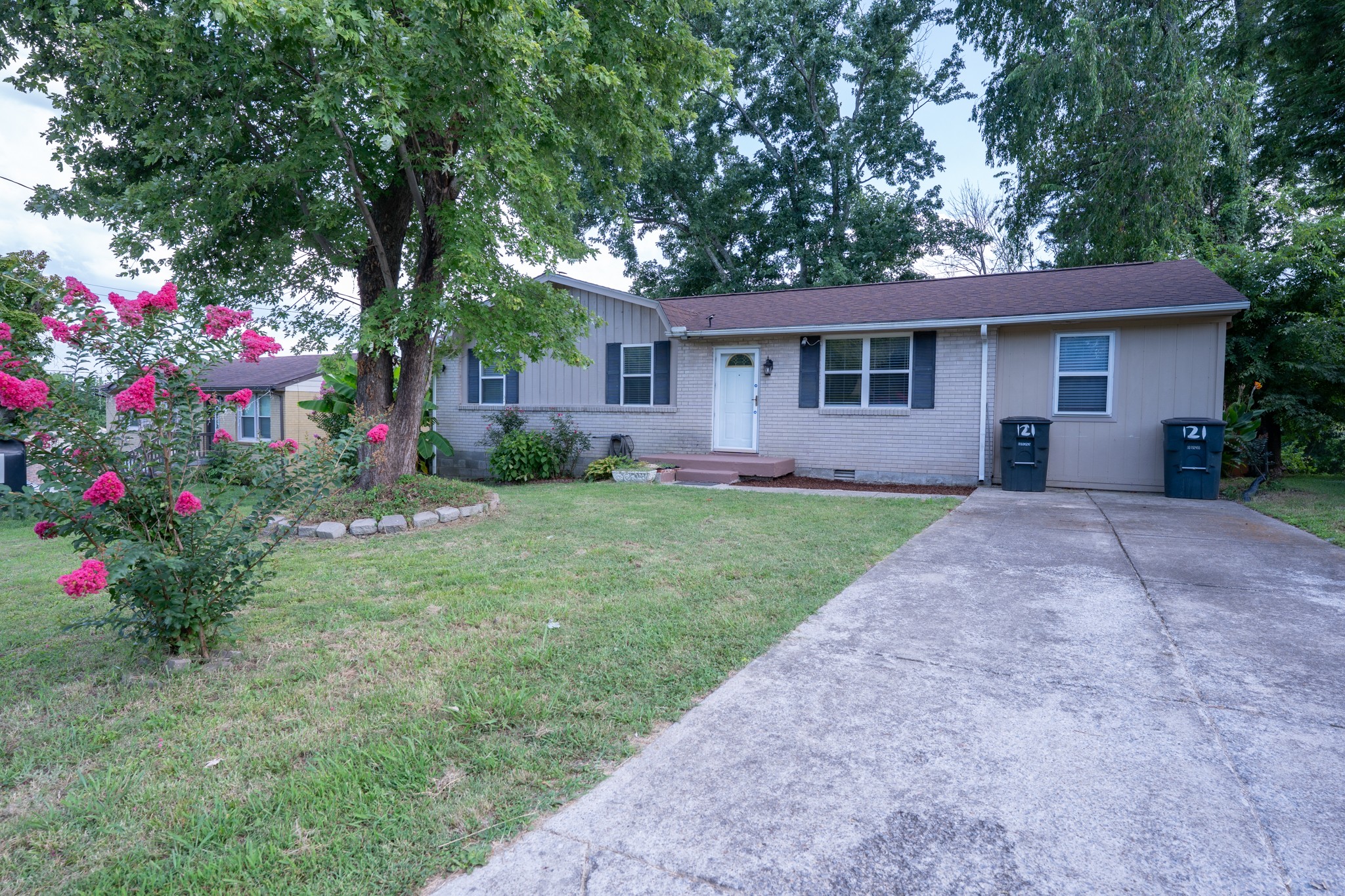 121 Tomarand Road Antioch, TN 37013 - Photo 33 of 34 a view of a house with a yard and tree s