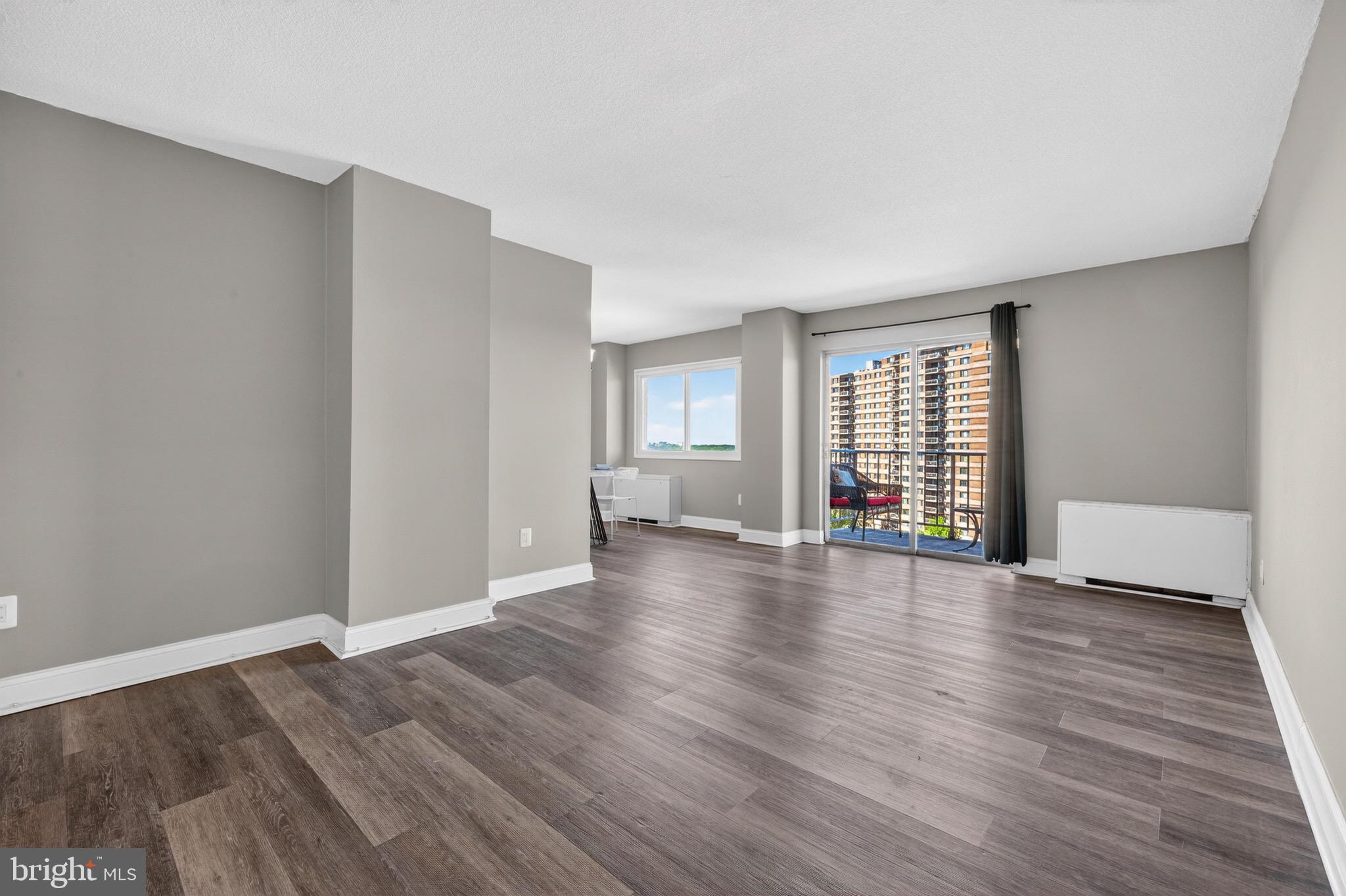 1121 University Boulevard West, Unit 912B Silver Spring, MD 20902 - Photo 14 of 29 Livingroom and Balcony