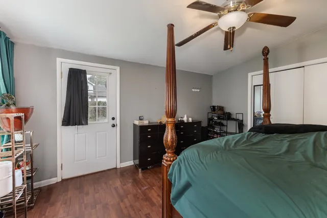 a bed room with a bed and a tv