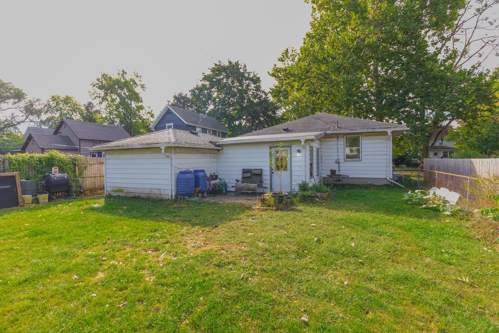 413 East Timber Street Pontiac, IL 61764 - Photo 23 of 36 a front view of a house with a garden