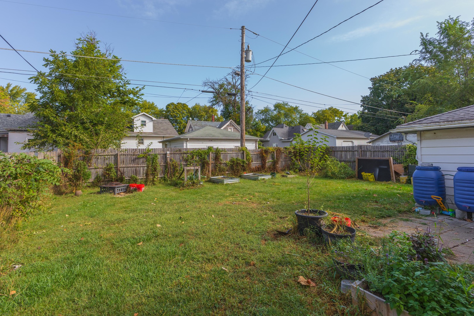 413 East Timber Street Pontiac, IL 61764 - Photo 28 of 36 a view of a house with a backyard and a garden