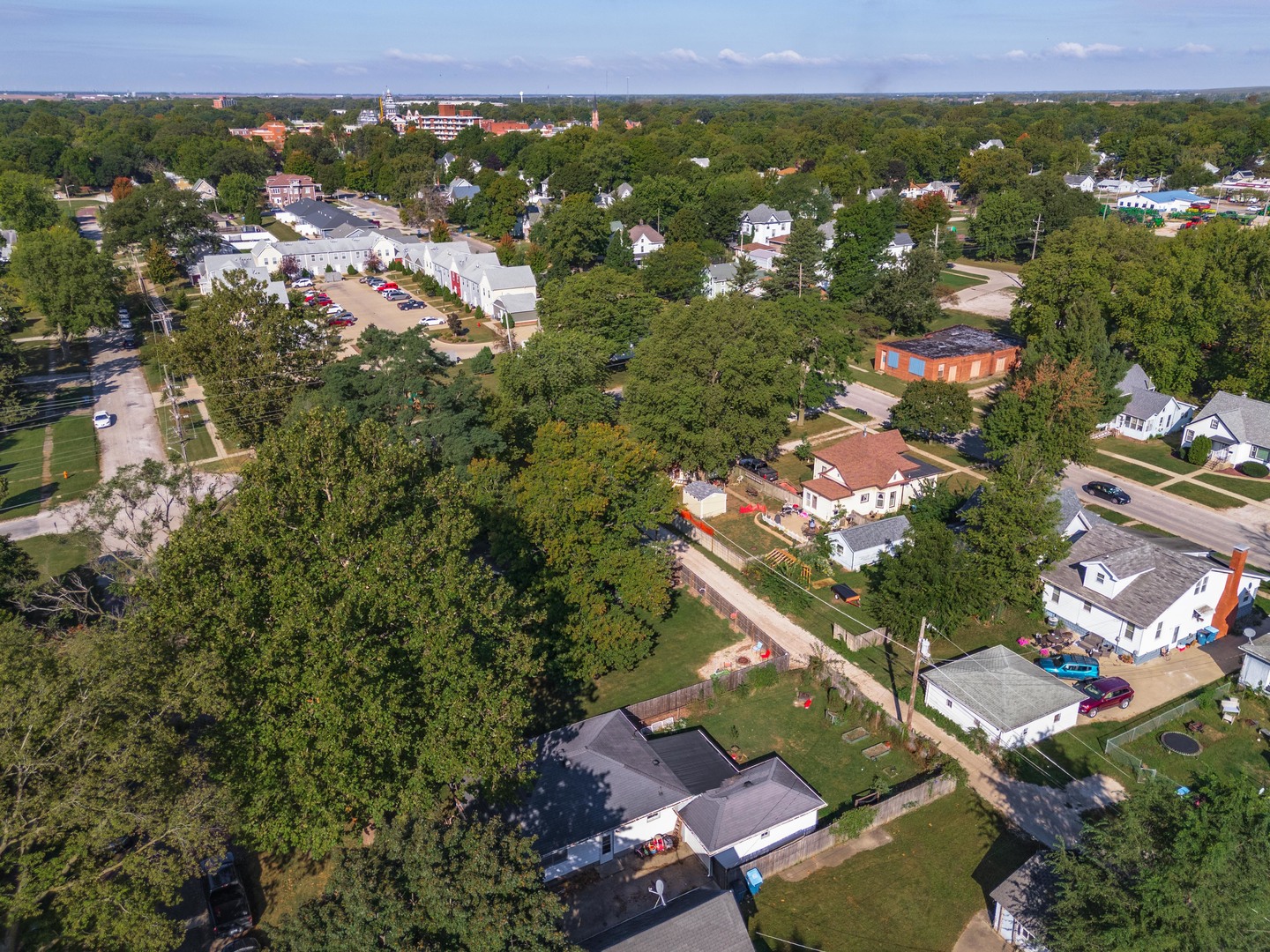 413 East Timber Street Pontiac, IL 61764 - Photo 33 of 36 an aerial view of residential houses with outdoor space and trees