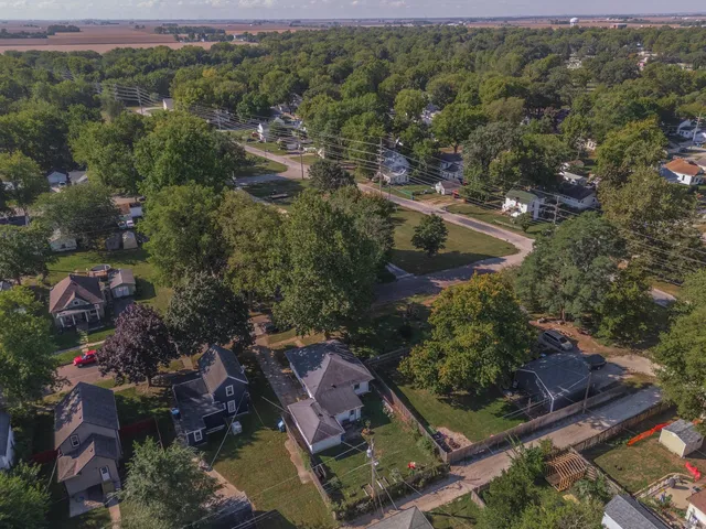 an aerial view of residential house with outdoor space