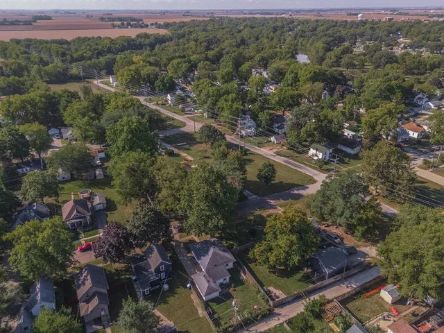 an aerial view of residential house with outdoor space