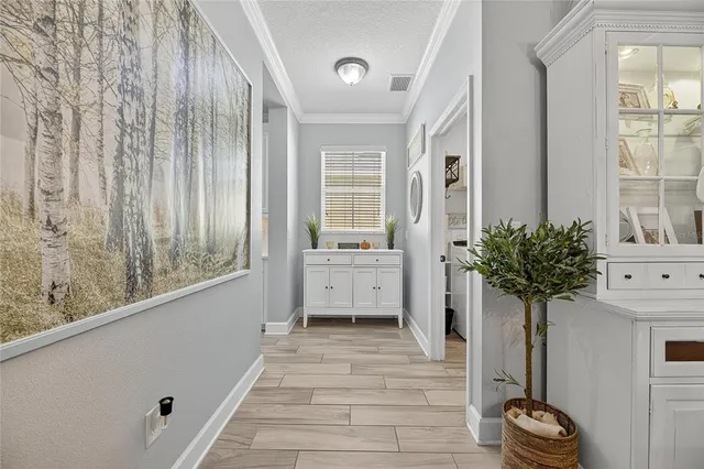 a kitchen with counter top space cabinets and appliances
