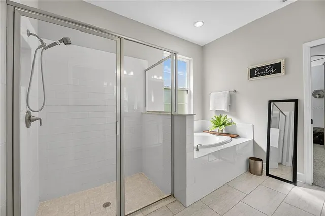 a view of a chairs and table in patio