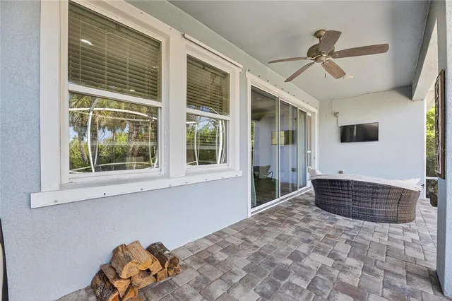 a view of a swimming pool with a patio
