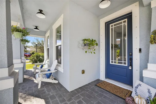 a work room with furniture and a window