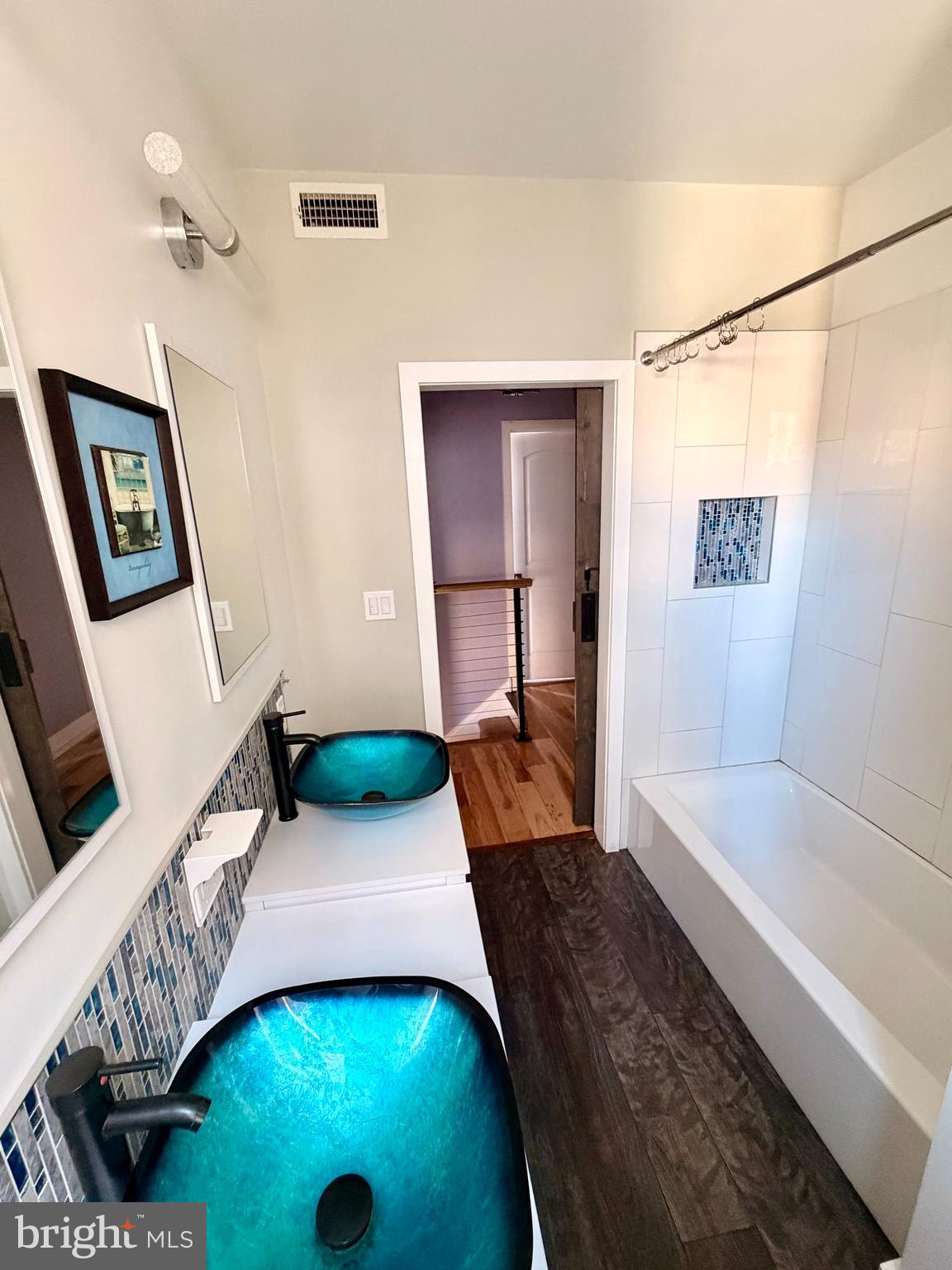 1944 Palethorp Street Philadelphia, PA 19122 - Photo 9 of 14 Double blue glass vessel sinks, sleek fixtures