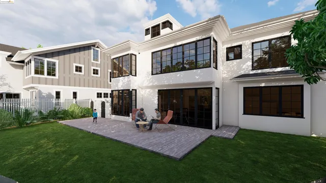 a view of a house with a yard and a garden