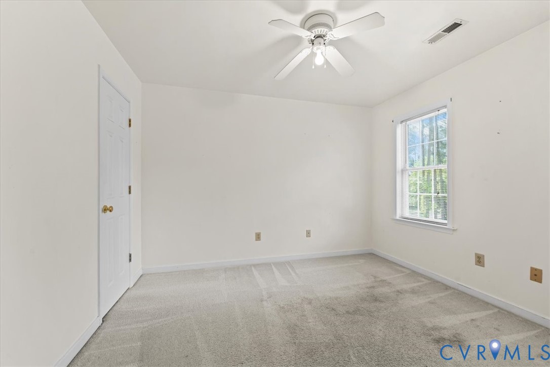 2924 Warfield Ridge Terrace Chester, VA 23831 - Photo 27 of 38 Room featuring neutral wall finishes, light-colore