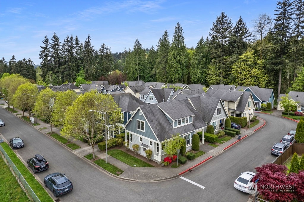 3326 239 Street Southeast Bothell, WA 98021 - Photo 3 of 38 an aerial view of a house with outdoor space