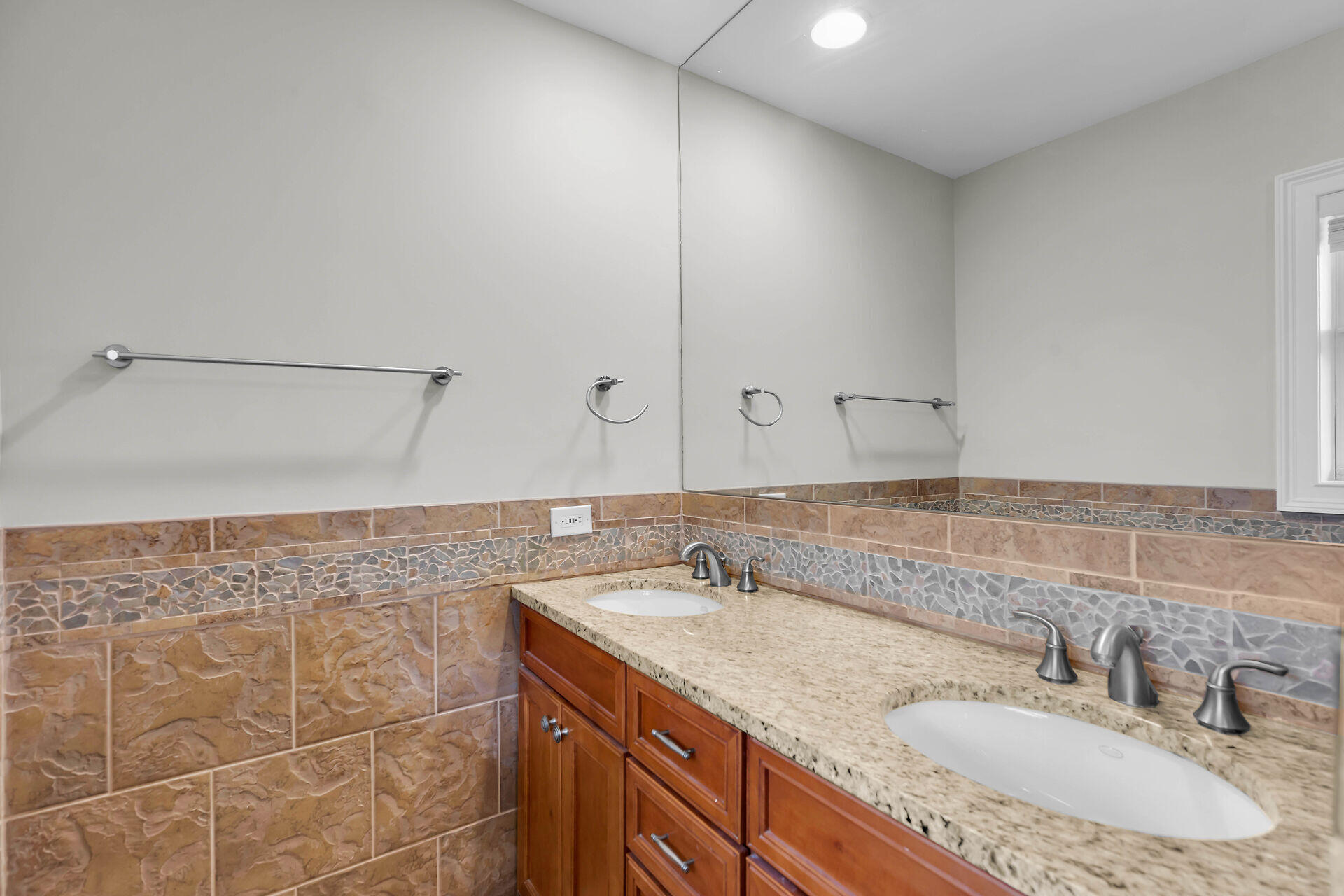 272 West Seaview Drive Duck Key, FL 33050 - Photo 13 of 26 a bathroom with a sink and a mirror