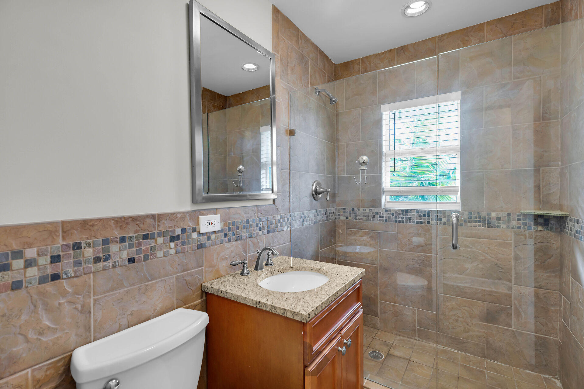 272 West Seaview Drive Duck Key, FL 33050 - Photo 16 of 26 a bathroom with a sink toilet and shower