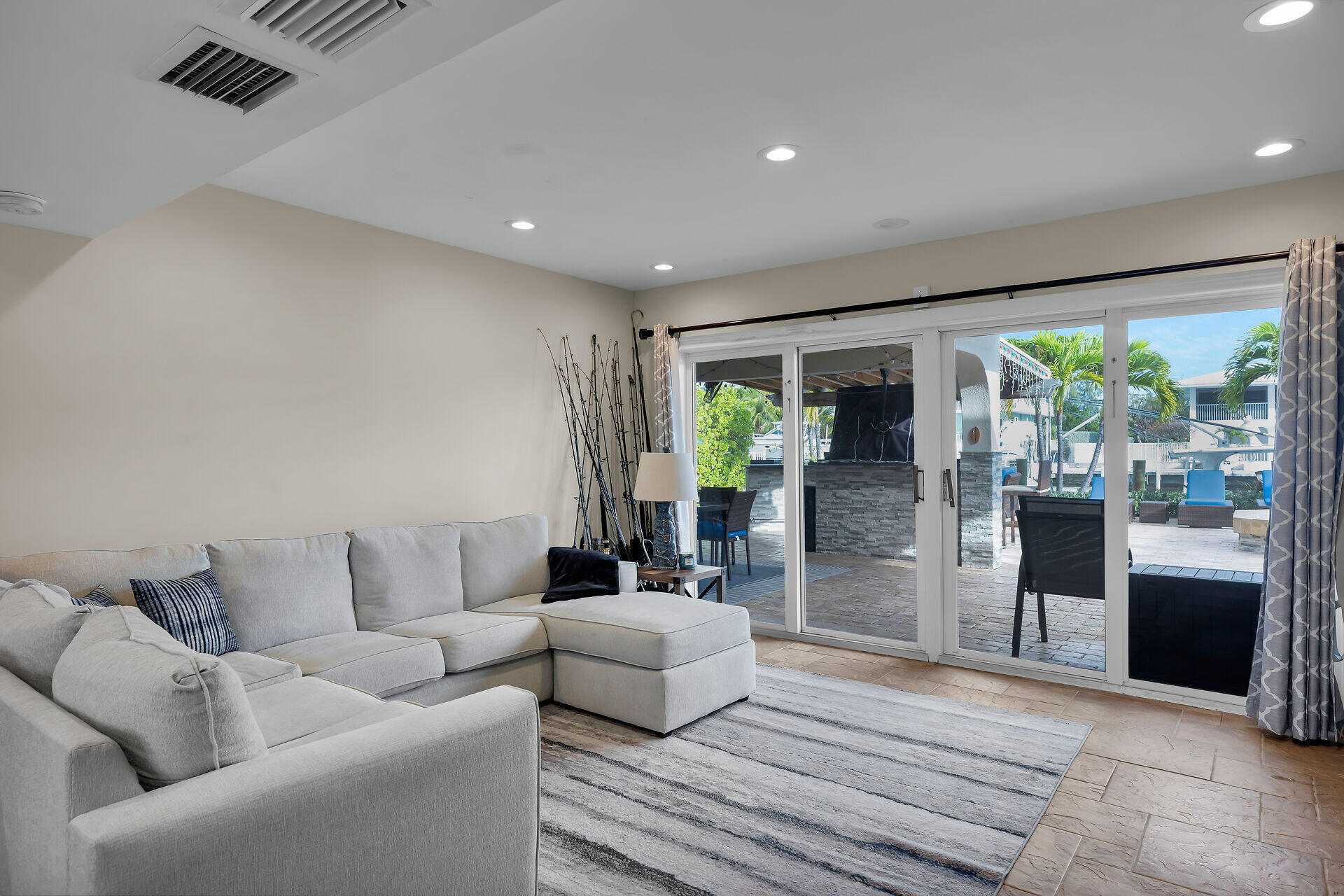 272 West Seaview Drive Duck Key, FL 33050 - Photo 18 of 26 a living room with furniture and a large window