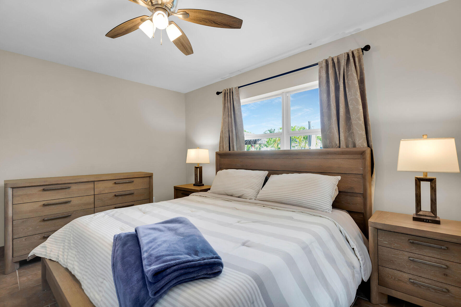 272 West Seaview Drive Duck Key, FL 33050 - Photo 19 of 26 a bedroom with a bed and a window
