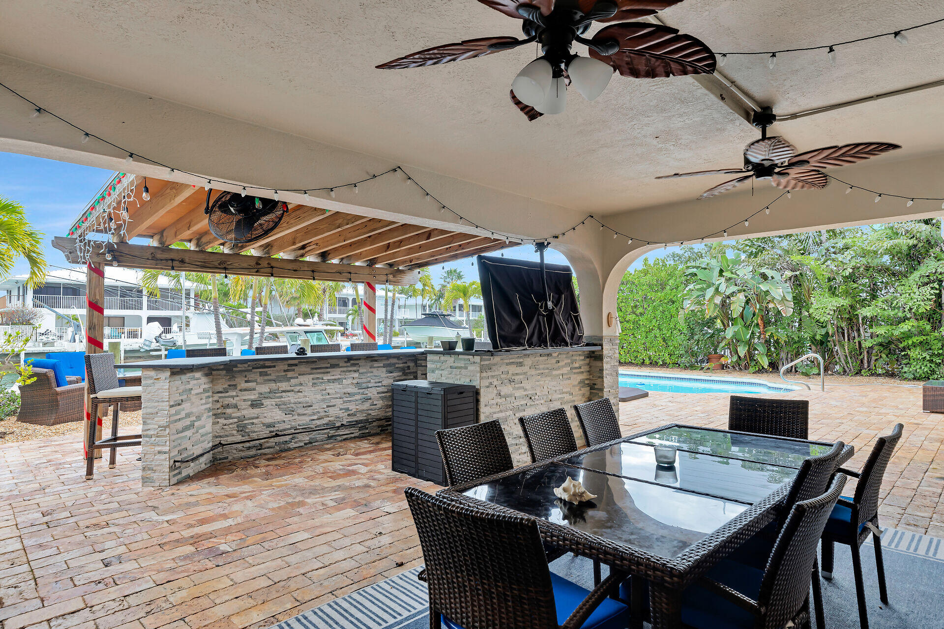 272 West Seaview Drive Duck Key, FL 33050 - Photo 21 of 26 a outdoor dining space with furniture and outdoor view