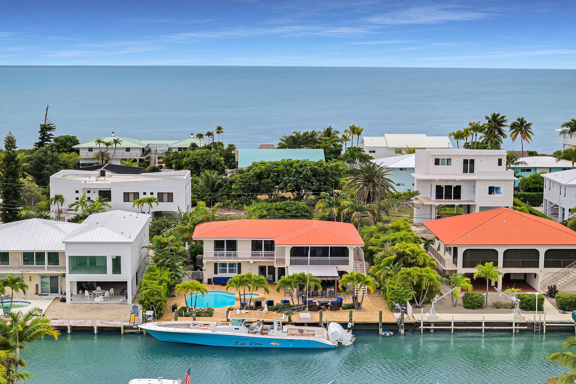 272 West Seaview Drive Duck Key, FL 33050 - Photo 24 of 26 a front view of a building with swimming pool and outdoor seating
