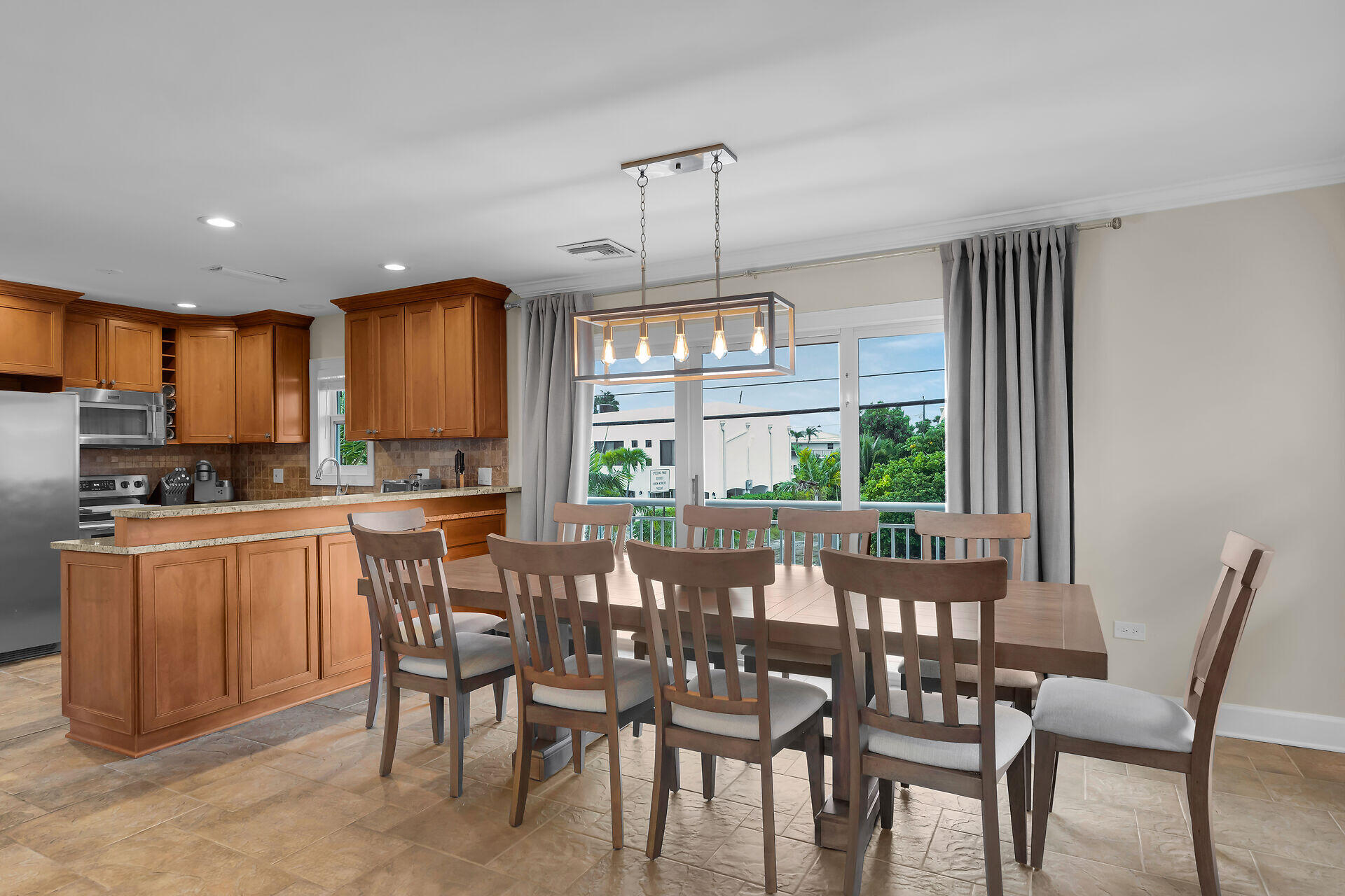 272 West Seaview Drive Duck Key, FL 33050 - Photo 7 of 26 a view of a dining room with furniture window and outside view