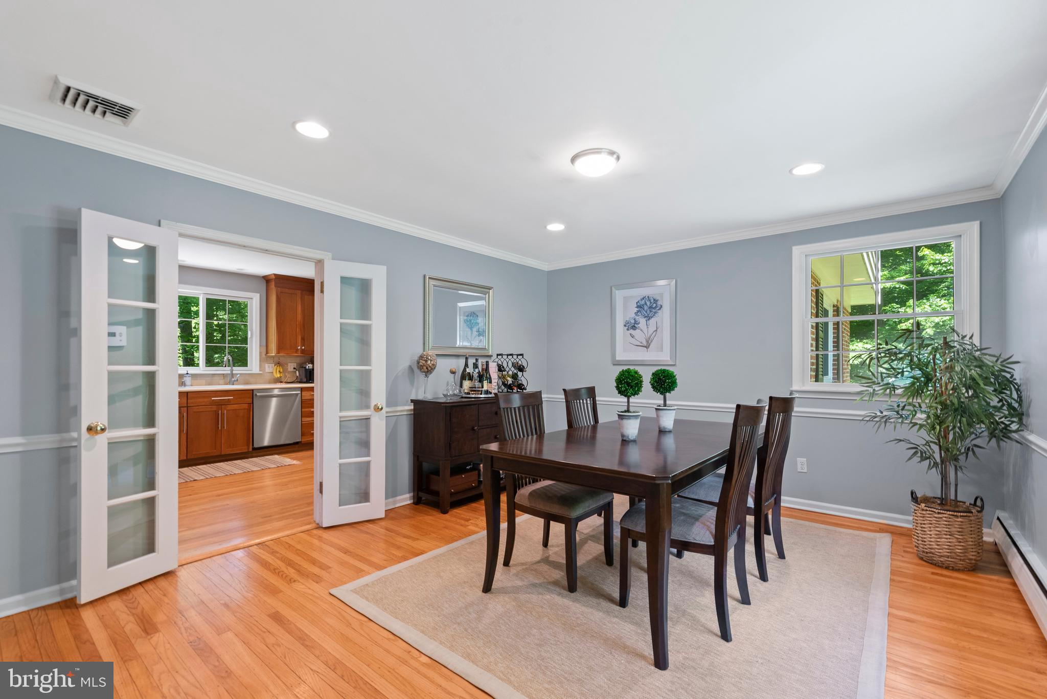 13 Spring Hollow Road Wayne, PA 19087 - Photo 4 of 34 Dining room with moldings and french doors