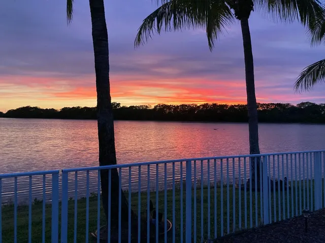 a view of lake and sunset