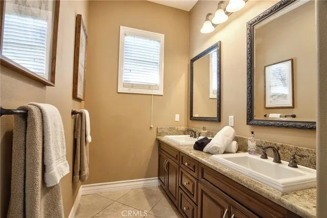 a view of a patio with couches and a big yard