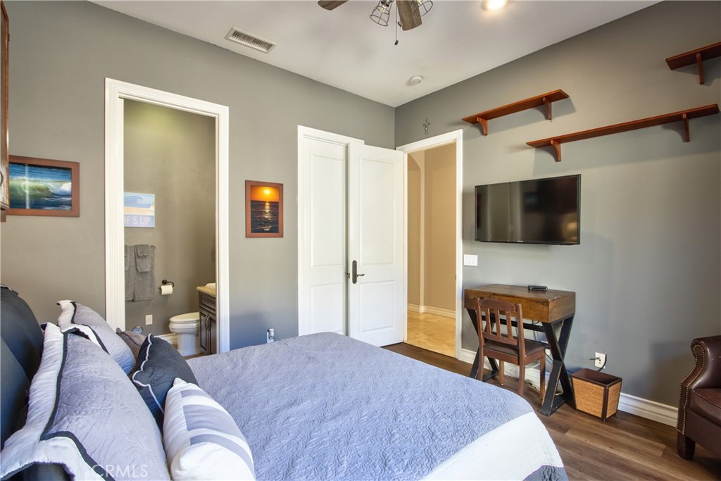 44195 Vía Horca Temecula, CA 92590 - Photo 38 of 74 a bedroom with a bed and a flat screen tv