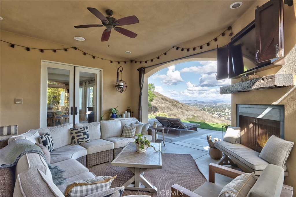 44195 Vía Horca Temecula, CA 92590 - Photo 51 of 74 a living room with furniture ceiling fan and a large window