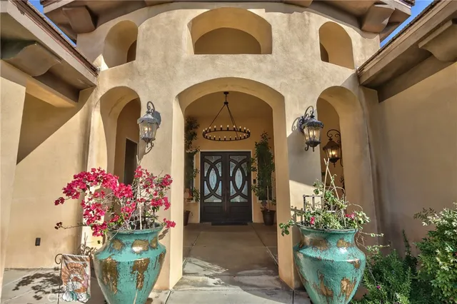 a front view of a house with a porch