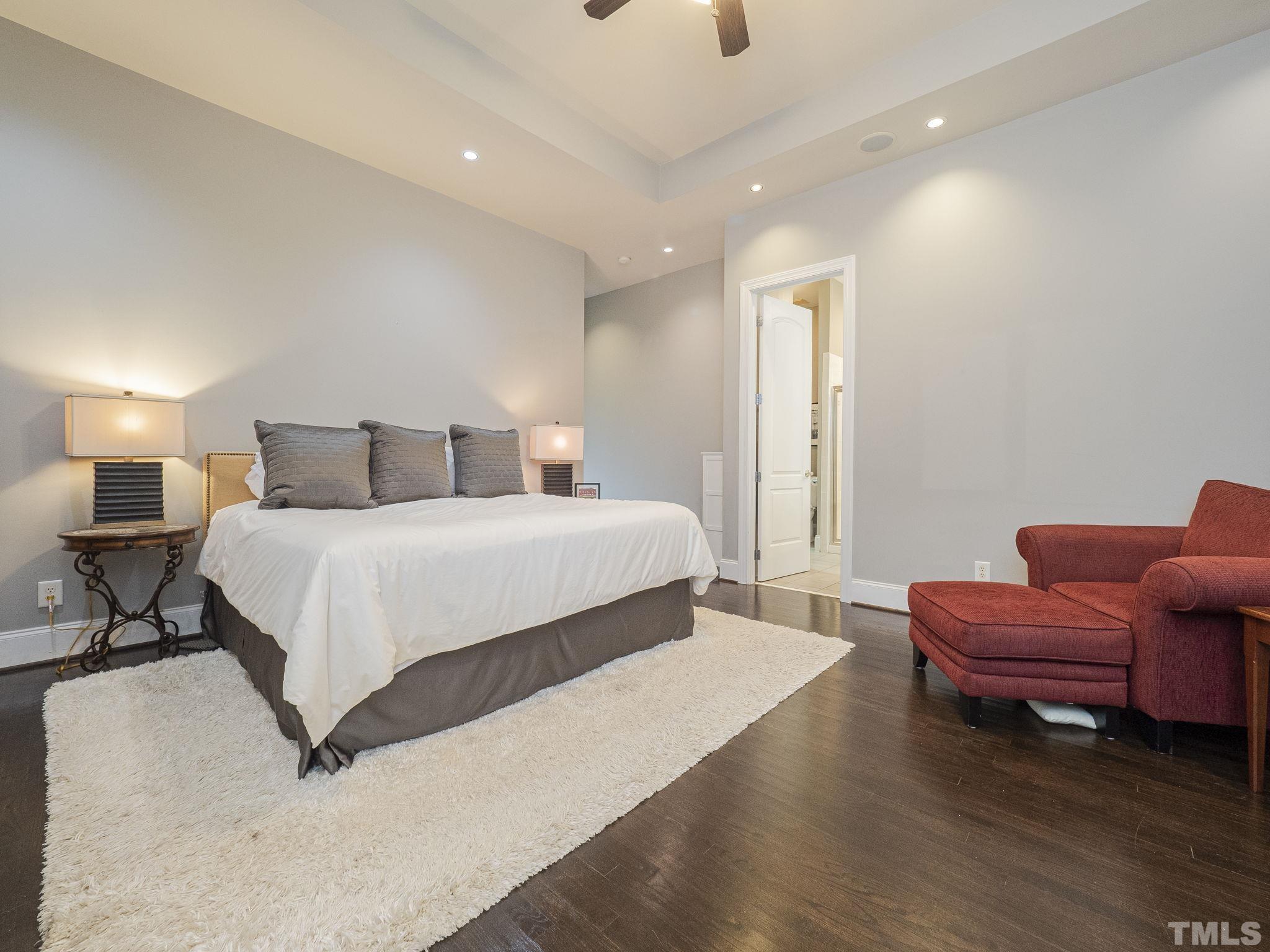 404 Brooks Avenue Raleigh, NC 27607 - Photo 12 of 18 a bedroom with a bed and a couch