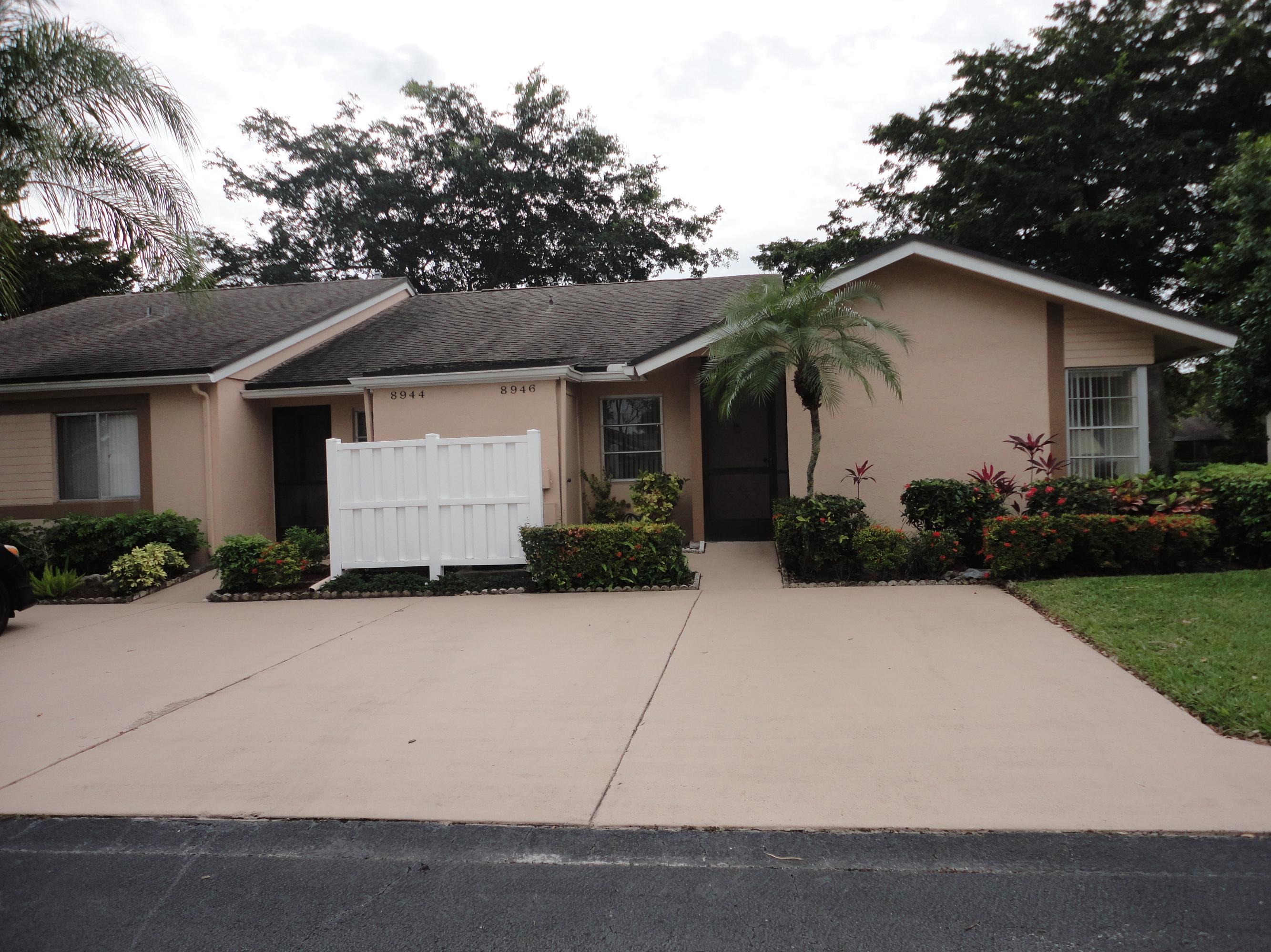 8946 Meadowlark Way, Unit D Boca Raton, FL 33496 - Photo 1 of 32 Front