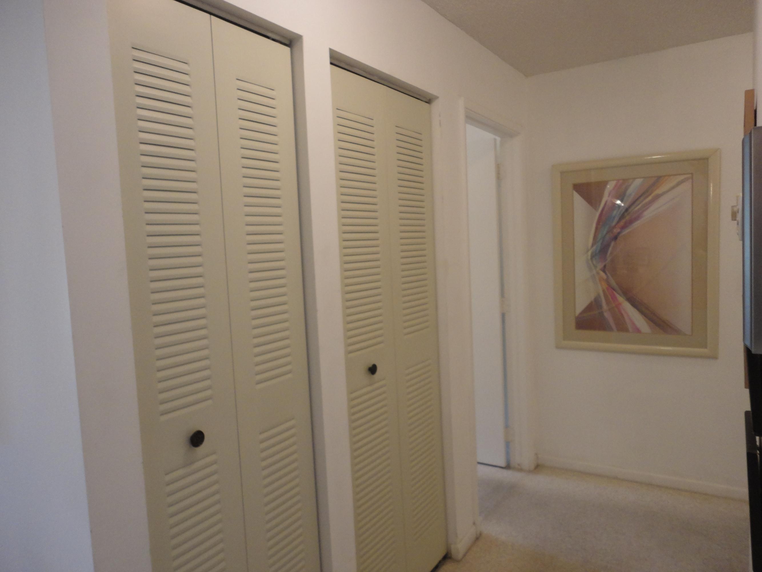 8946 Meadowlark Way, Unit D Boca Raton, FL 33496 - Photo 14 of 32 Hallway Closet