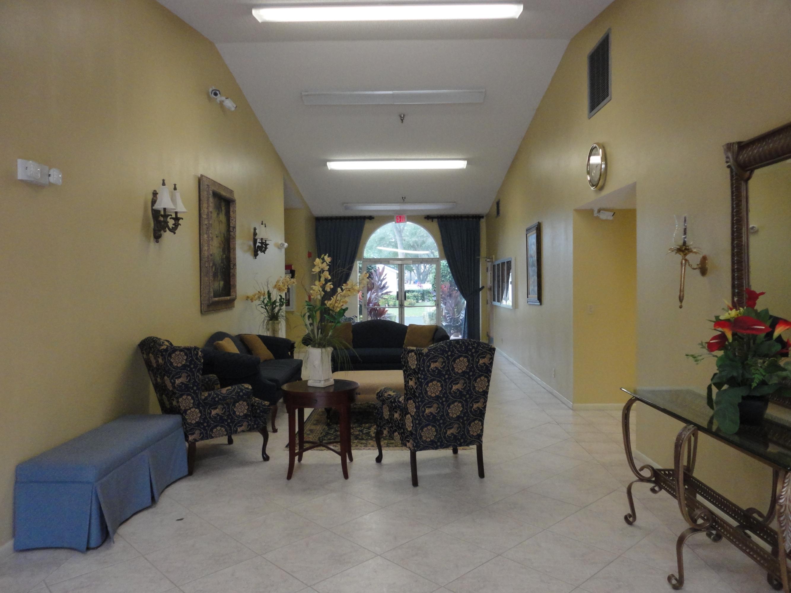 8946 Meadowlark Way, Unit D Boca Raton, FL 33496 - Photo 20 of 32 Parklane Clubhouse Lobby